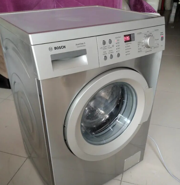 Bosch 8kg sıfır ayarında çamaşır makinesi A+++ 1. Adım: Deterjanı ve yumuşatıcıyı